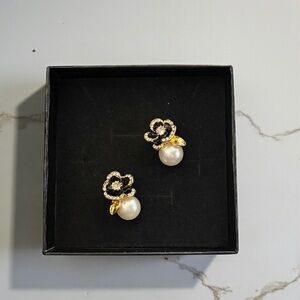 Elegant Gold and Black Floral Pearl Earrings in a Black Jewelry Box